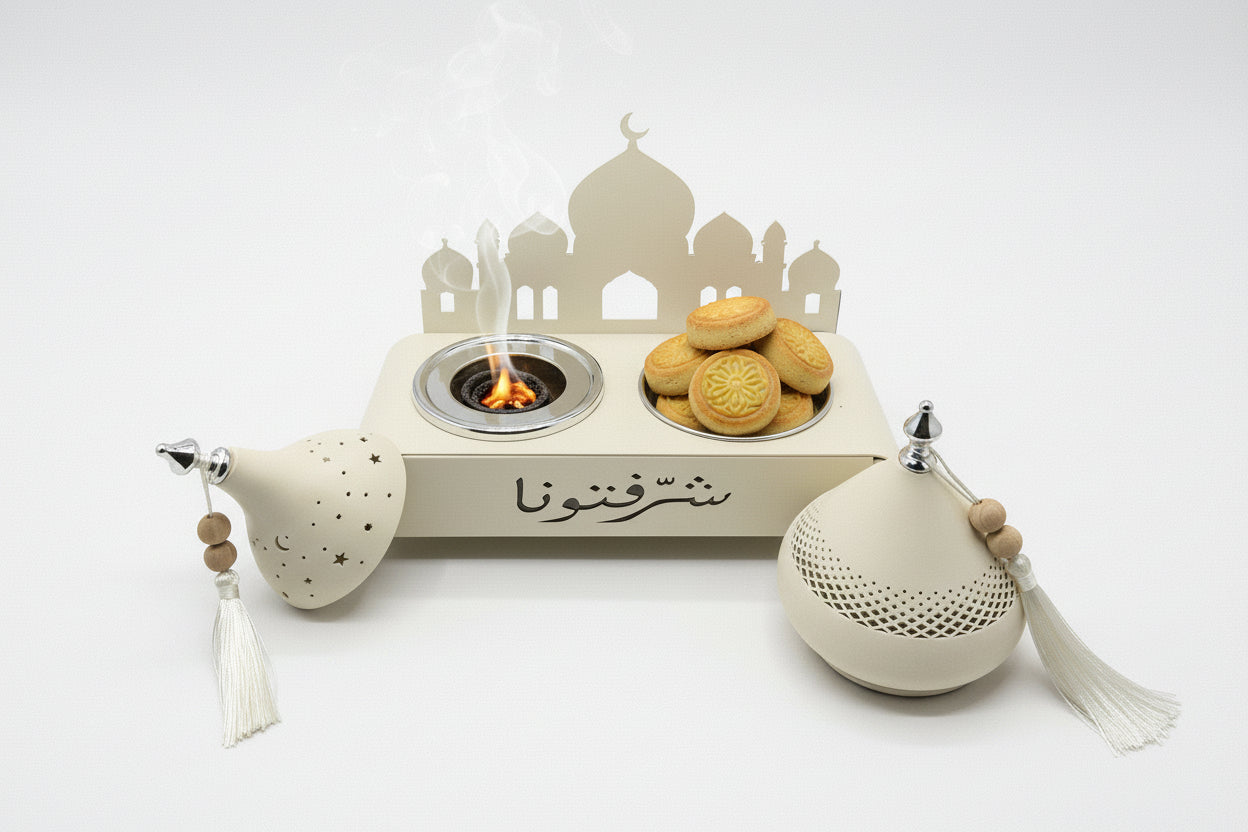 Decorative wall-mounted fixture with intricate designs on a gray wall.