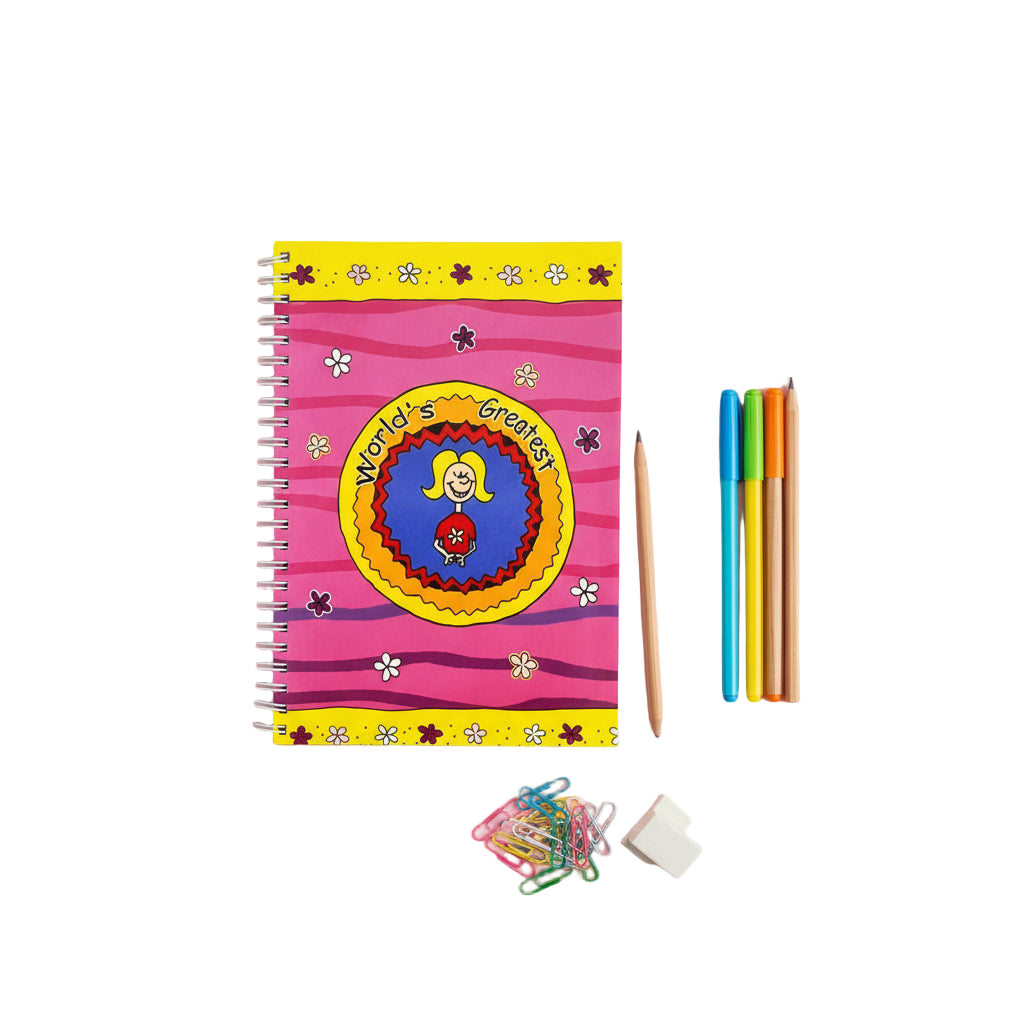 Colorful notebook with 'World's Greatest' design on a pink background with stationery items.