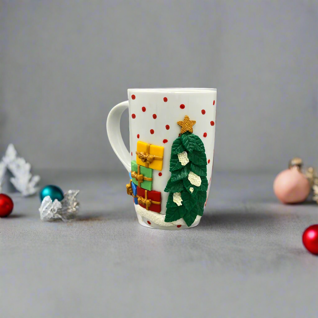 A ceramic mug with a 3D Christmas tree design, featuring a white base color with red polka dots and a green Christmas tree, placed on a grey surface with Christmas decorations around it.