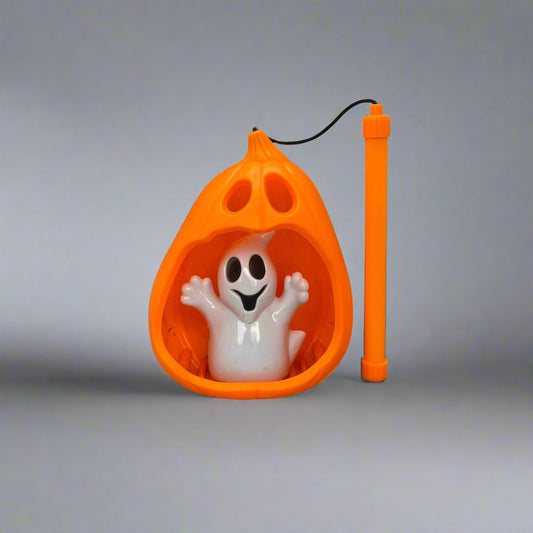 Halloween-themed orange bucket with a white ghost figure on a gray background