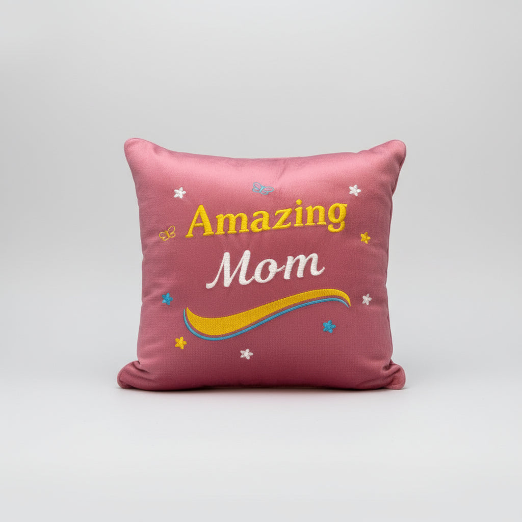 Pink pillow with 'Amazing Mom' text on a white background