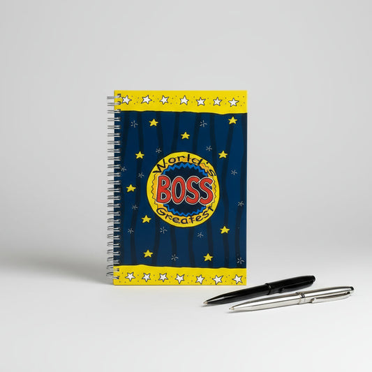 Notebook with 'BOSS' logo on a wooden surface