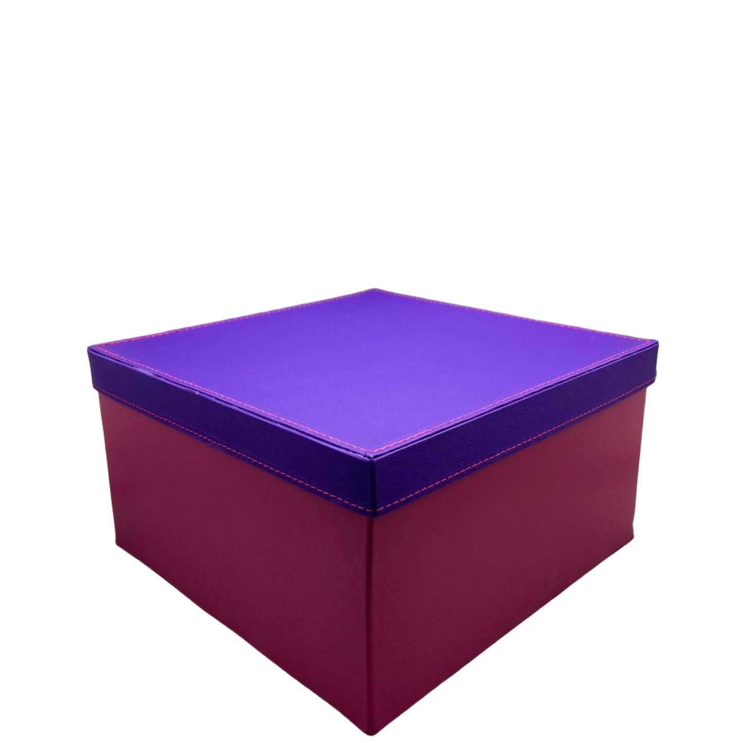 Geometric wall art piece with purple and red hexagonal shapes on a plain background