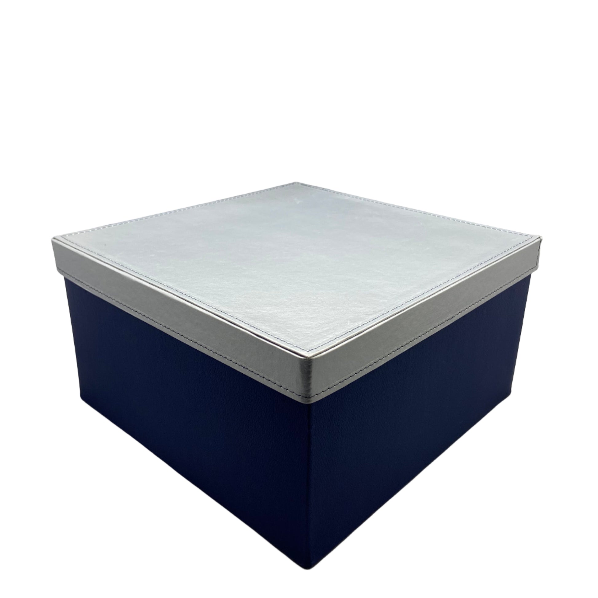 Geometric wall art piece with blue and white hexagonal design on a plain background