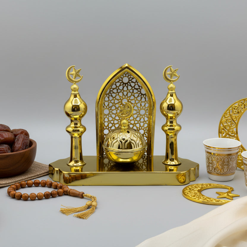 Gold decorative item on a gray surface