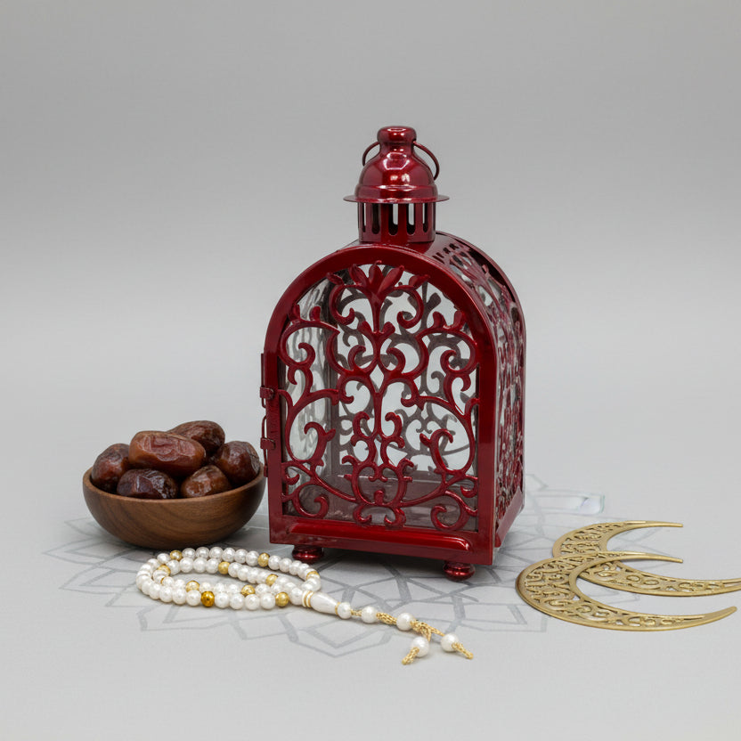 Decorative red metal object on a white background