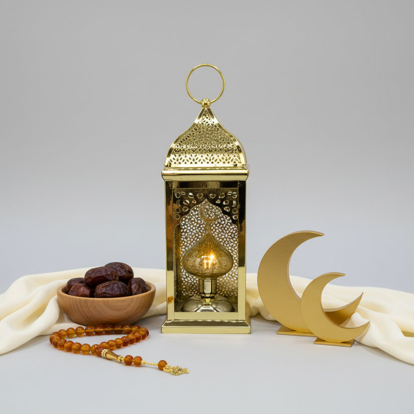 Decorative gold lantern on a plain background